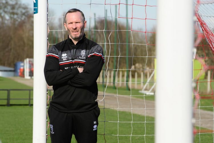 Michael Appleton after signing a new contract with the Imps. Credit: Lincoln City