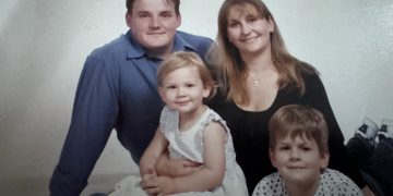 A photograph of Paul and Sandra Reeve with their two children, before Sandra was diagnosed with MND