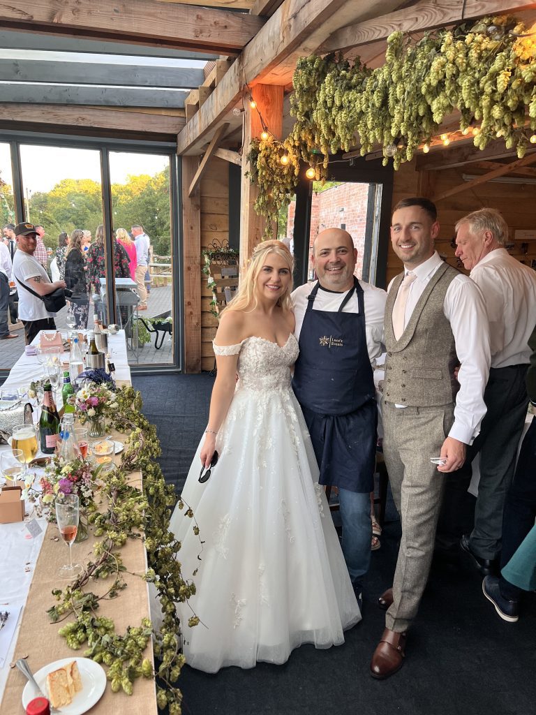 Laur, the Chef Owner with Emma and Jack - bride and groom.