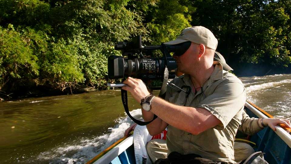 Kevin Augello filming in Borneo.