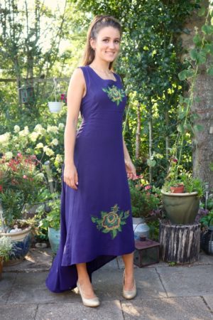 Beautiful purple long party dress with flower embroidery. Perfect for a night out.