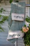 Elegant towels in a light dusty green color and organic cotton quality. Handmade embroidery at the border
