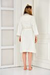 The back of a white bathrobe for women in organic cotton