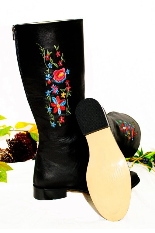 Elegant long black leather boots in handmade quality