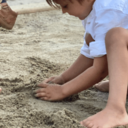 Kids earthing through barefoot play