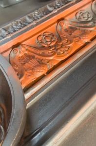 orange bronze compound