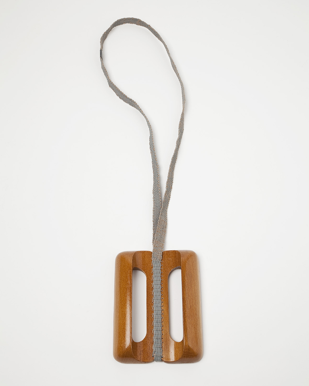 Barbara Schrobenhauser, Vom Tragen und Halten VI, 2018, necklace; used wooden handles, woven string, 470 x 90 x 20 mm, €700