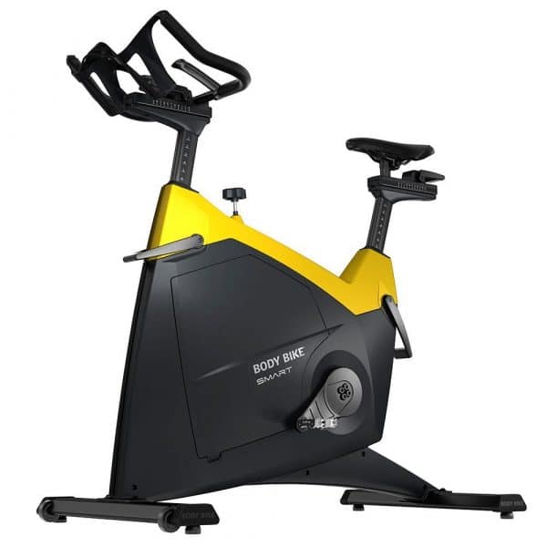 Body Bike Smart+ i gul - motionscykel i høj kvalitet. Spinningcykel til både professionel og hjemme brug