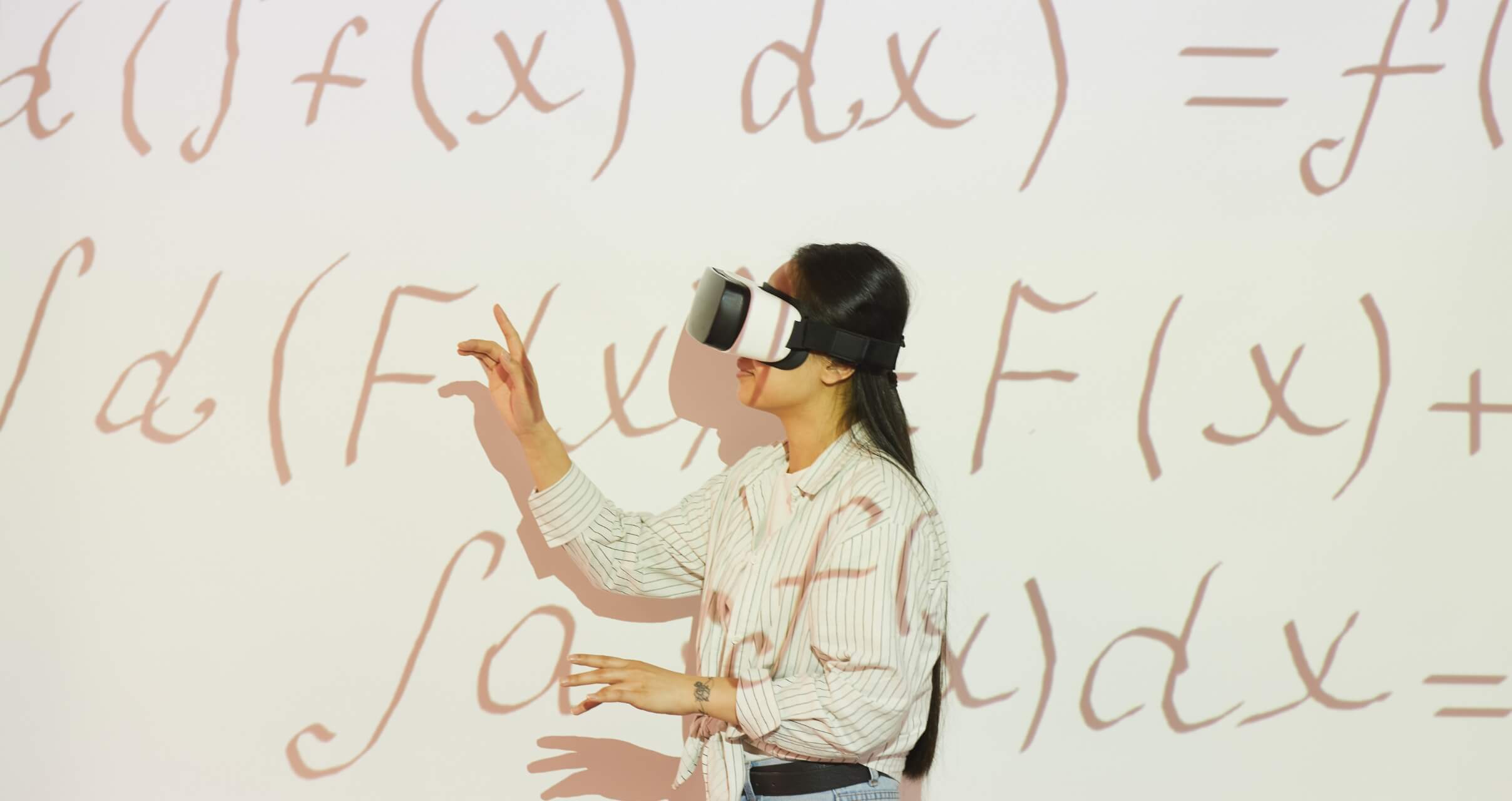 Girl doing VR Math