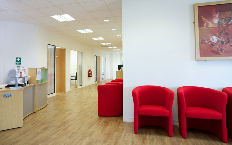 Red chairs in a waiting room