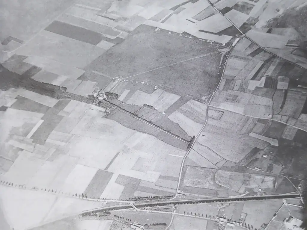 an aerial view of a rural area with roads and fields