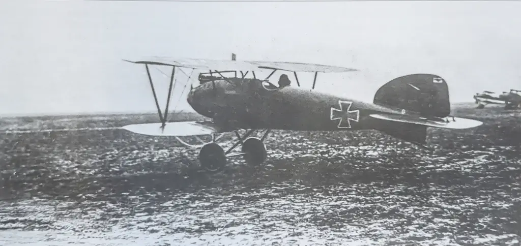 an old photo of two airplanes in the air