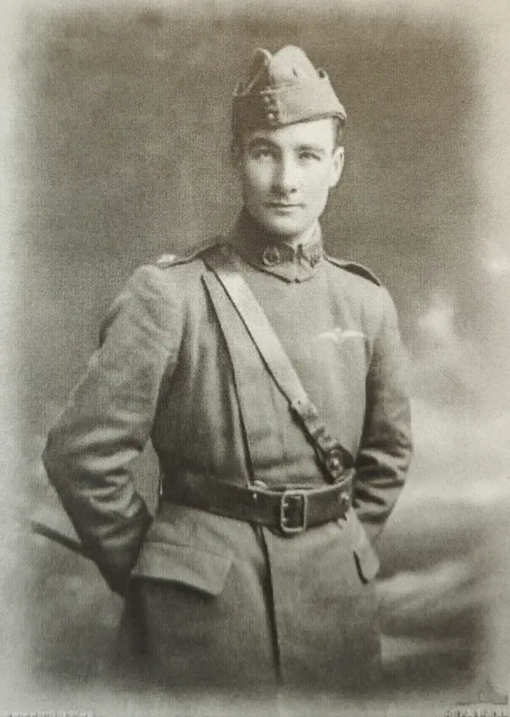 an old photo of a man in uniform