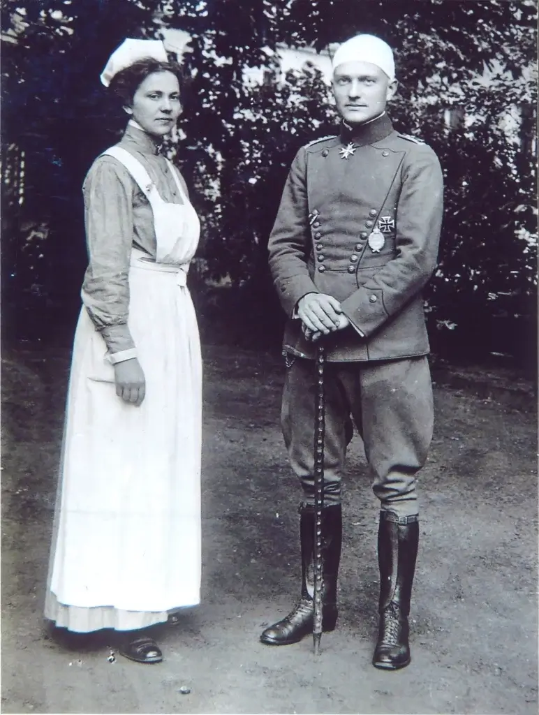 an old black and white photo of two people