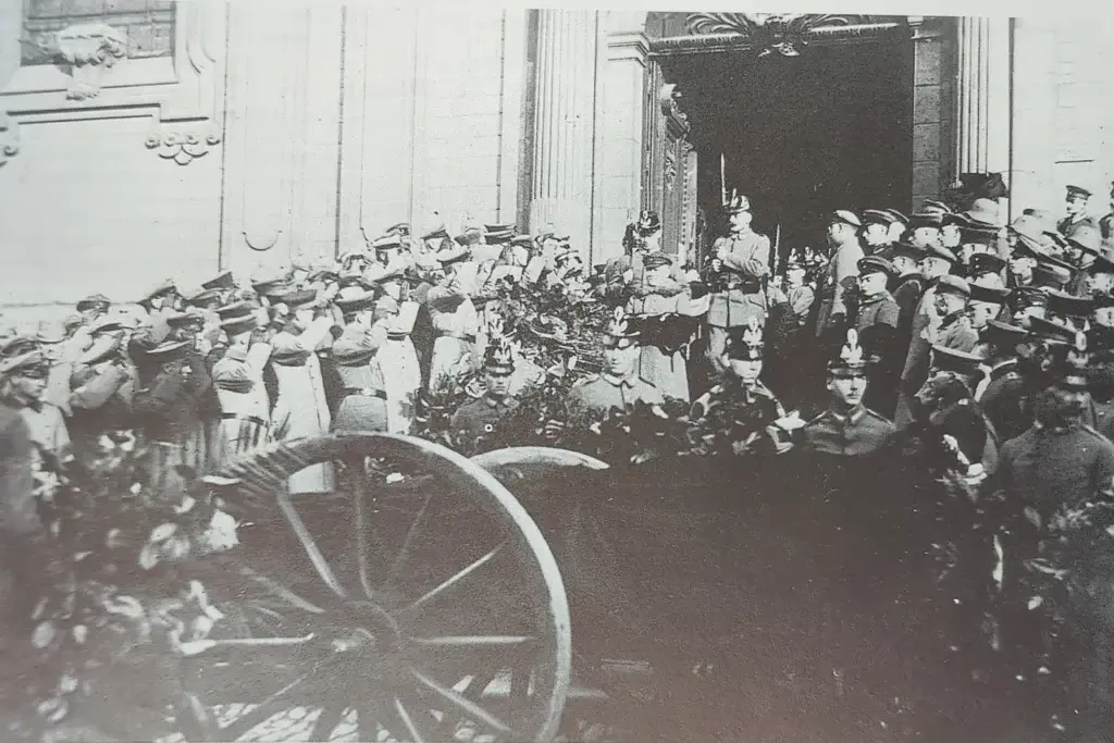 a group of people standing in front of a building