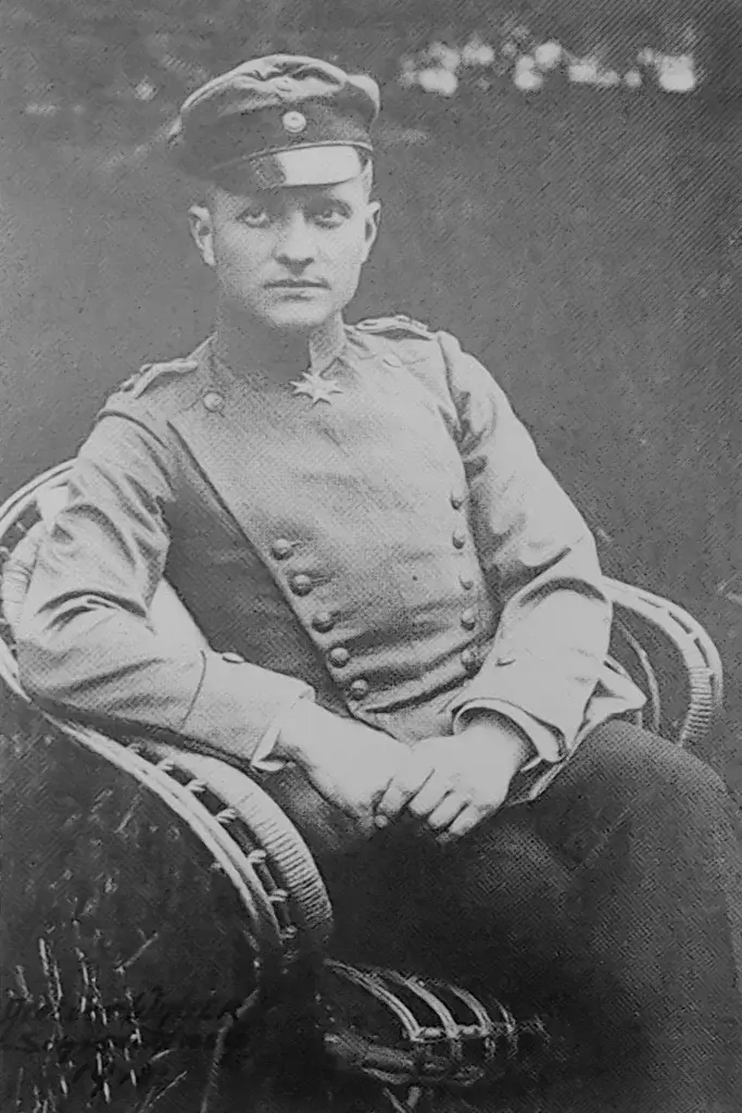 an old photo of a man in uniform