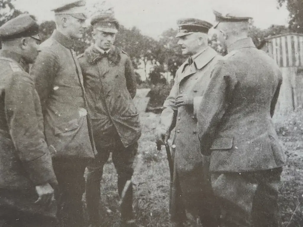 a group of men standing next to each other