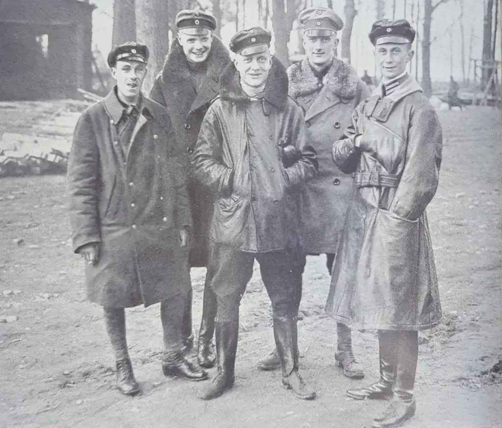 a group of men standing next to each other