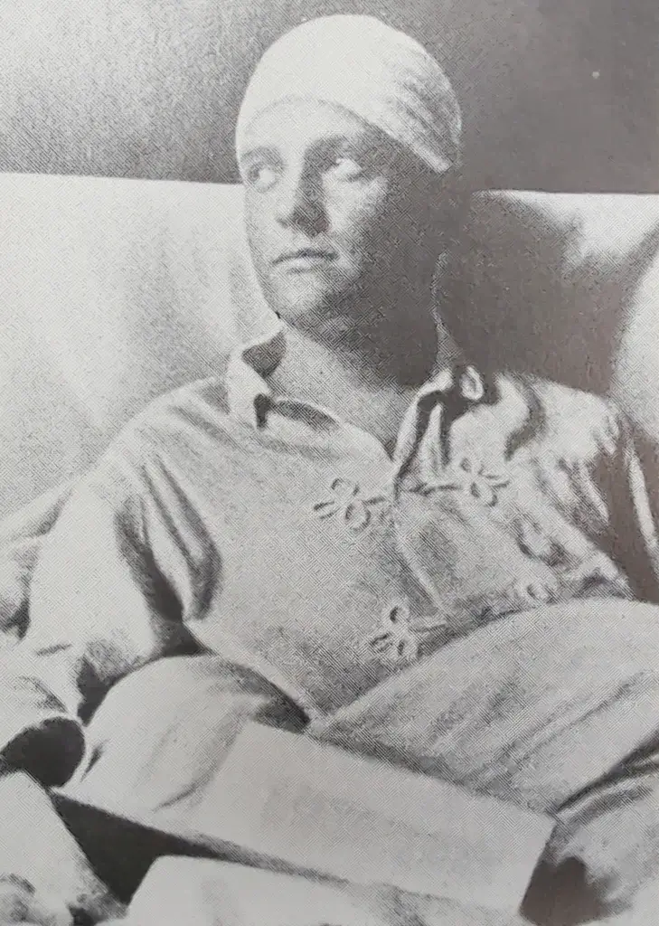 an old black and white photo of a man with a turban