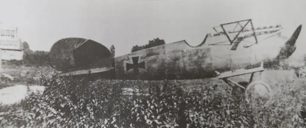 an old airplane is sitting in a field