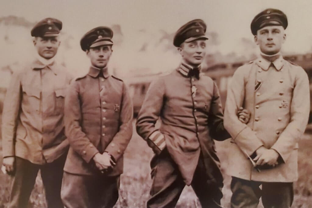 a group of men standing next to each other