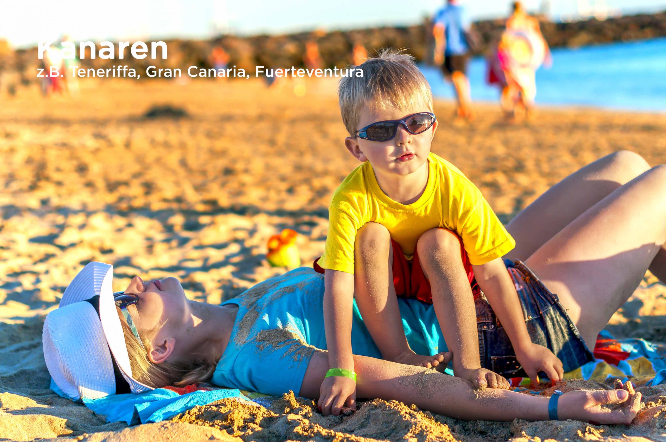 Little,Boy,Playing,With,A,Sand,On,The,Beautiful,Beach