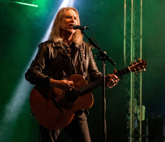 Justin Sullivan (New Model Army) Justin Sullivan (New Model Army) on stage playing guitar and singing.