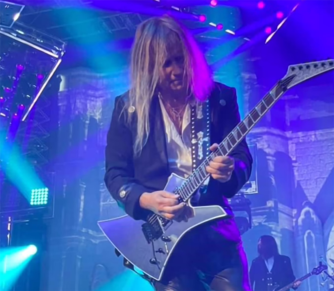 Chris-Caffery-featured-image photograph of guitarist Chris Caffery on stage playing guitar.