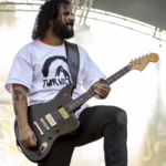 Aziz Bentot singer and guitarist of Bad Situation performing live.