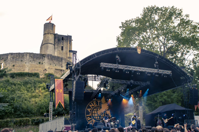 View of the stage of the Kave Fest with the Castle of Gisors in the background.