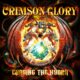 Album cover for Crimson Glory's 'Chasing the Hydra.' The band name is printed in an orange-yellowish front on the top middle and the album title is printed in yellow on the bottom middle. There are five angry dragons in the center alongside a sparkling green gem. The colors on the album cover include yellow, orange, black, green, and blue.