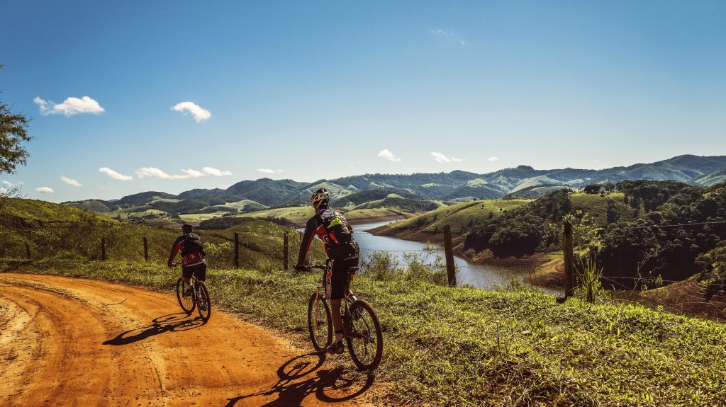 cyclists-trail-bike-clouds-163407.jpeg