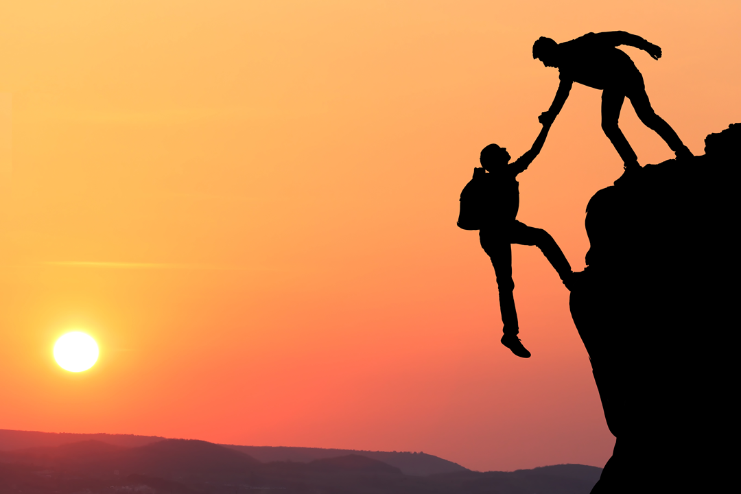 Two people on a mountain