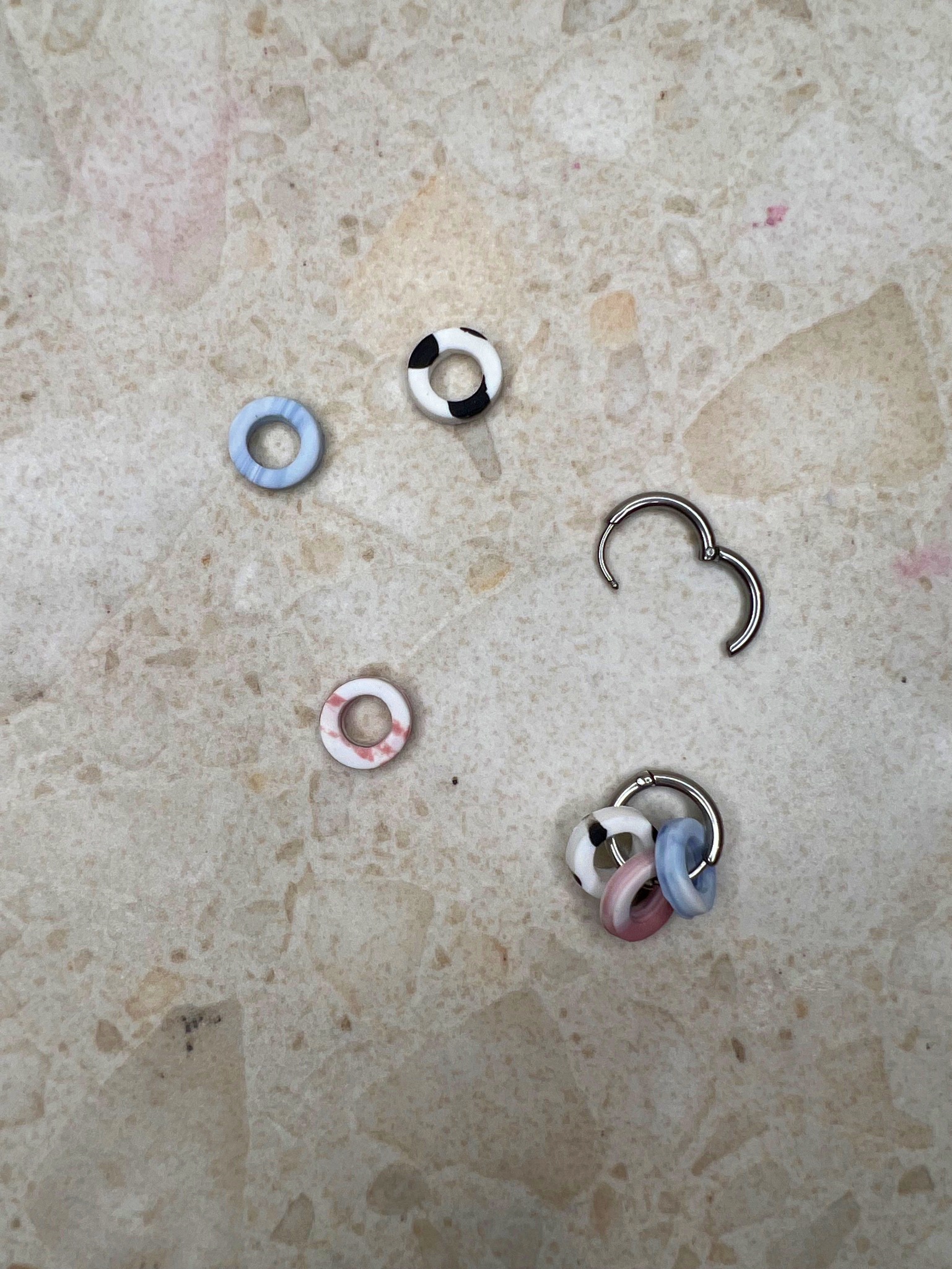 Handmade small silver hoop earrings with polymer clay charms