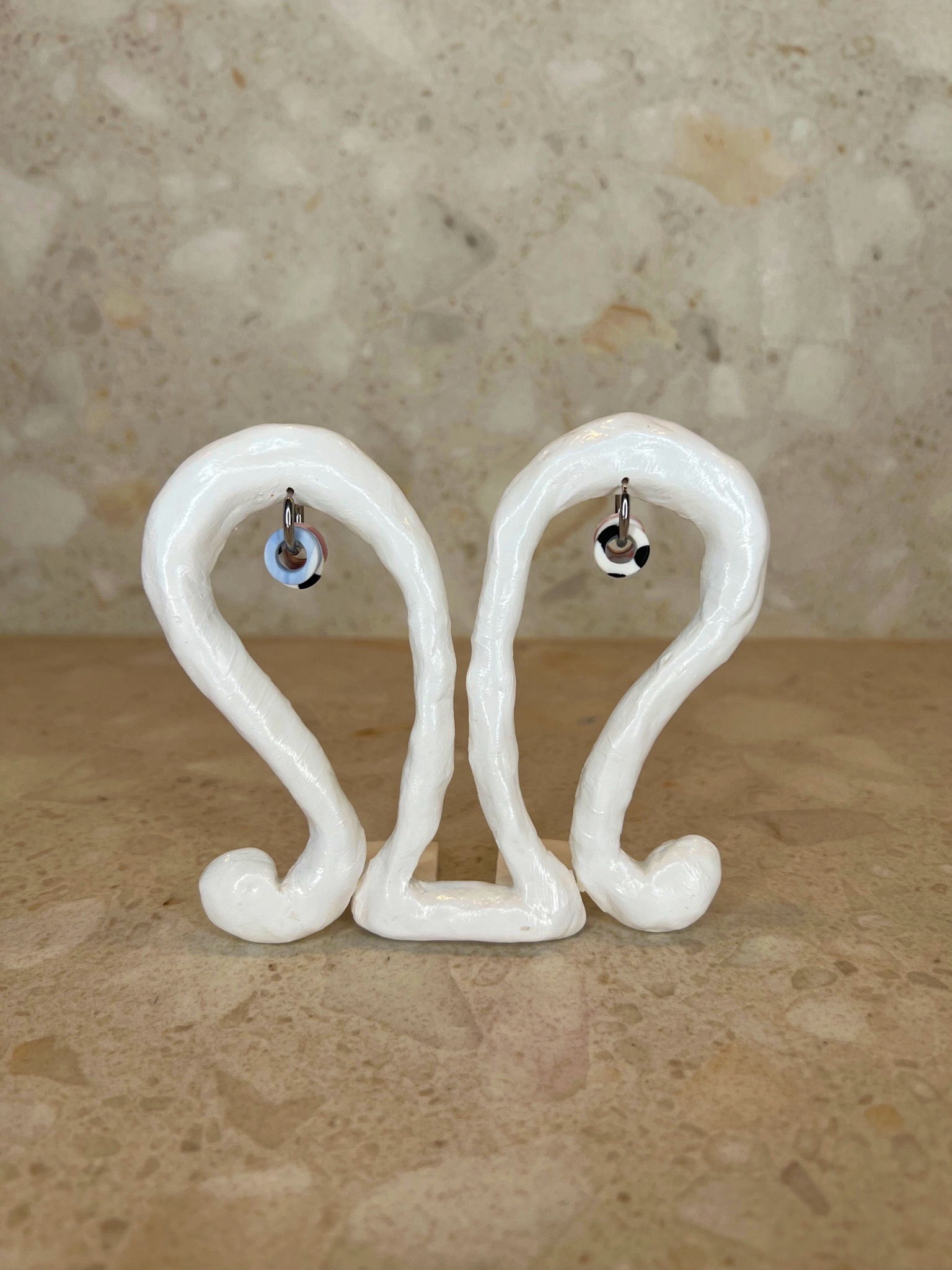 Handmade small silver hoop earrings with polymer clay charms