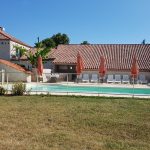 The house and the Barn with the pool