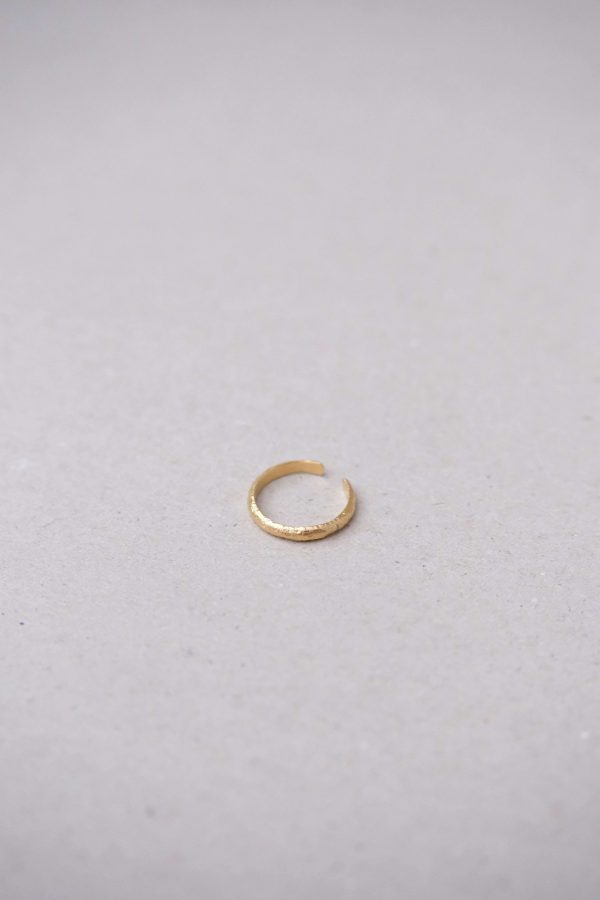 flatlay of the Cleo Ring by the brand Agapé Studio