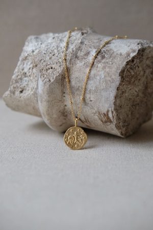 the Aquarius Necklace by the brand Agapé Studio