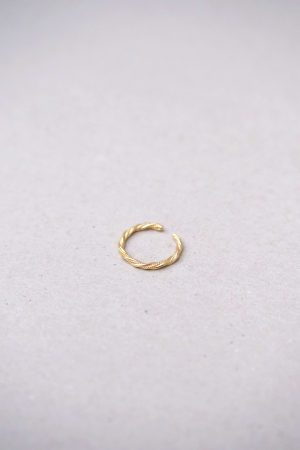 flatlay of the Aristide Ring by the brand Agapé Studio
