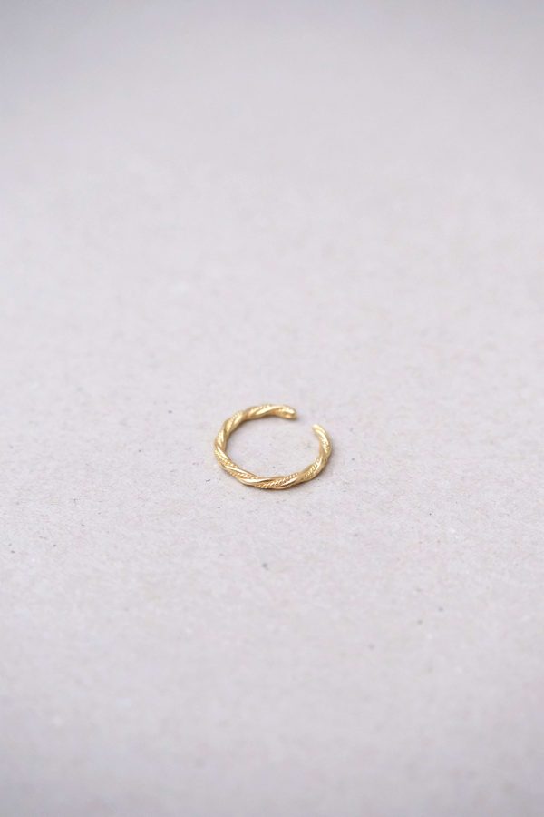 flatlay of the Aristide Ring by the brand Agapé Studio