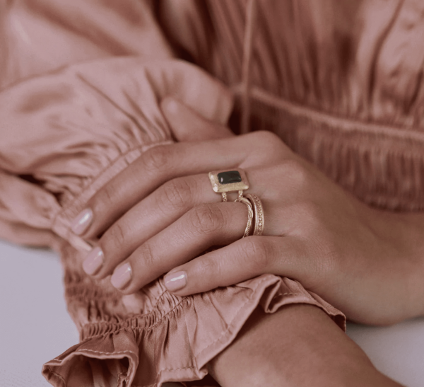 woman wearing the Aristide Ring by the brand Agape Studio