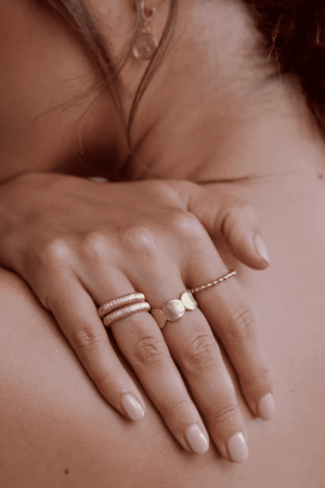 woman wearing the Come Ring by the brand Agapé Studio