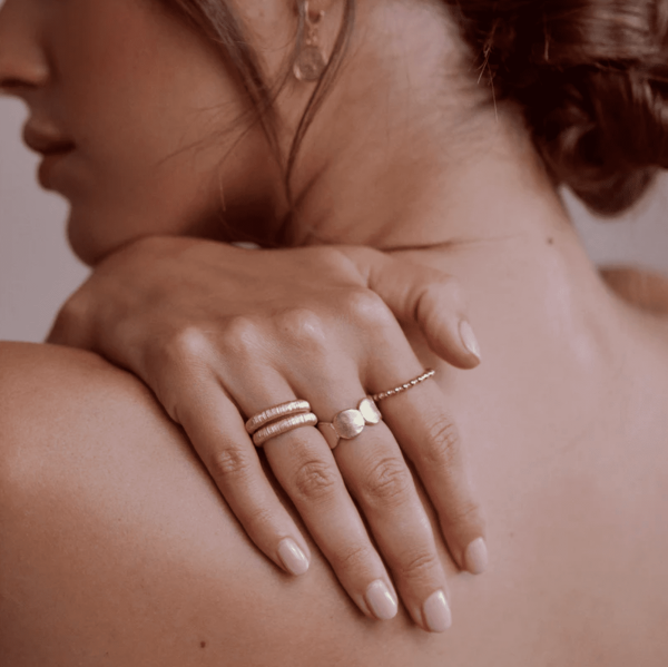 woman wearing the Come Ring by the brand Agapé Studio