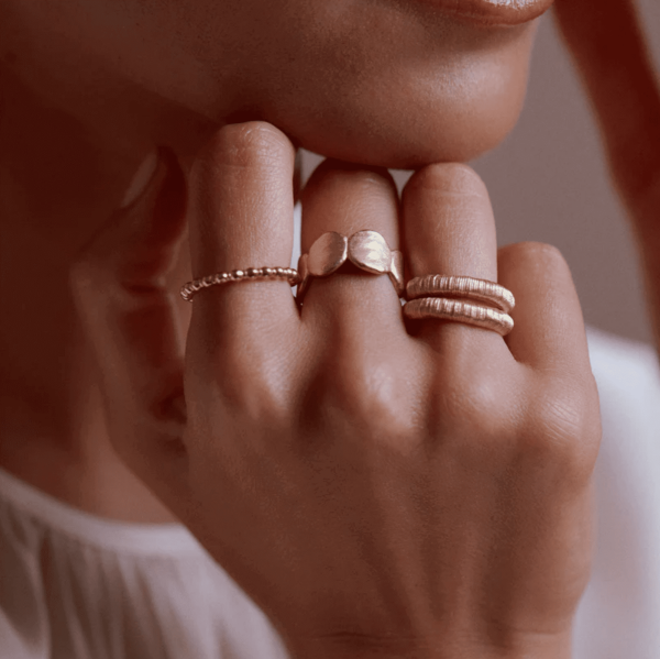 woman wearing the Come Ring by the brand Agapé Studio