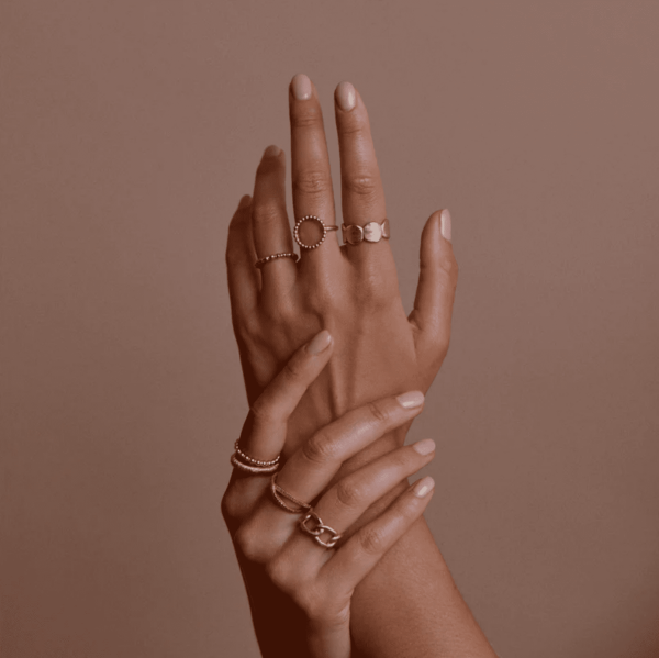 woman wearing the Elna Ring by the brand Agapé Studio