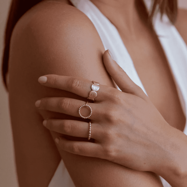 woman wearing the Hector Ring by the brand Agapé Studio