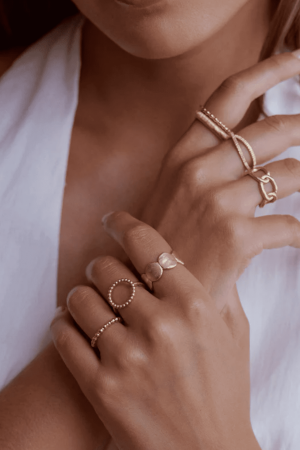 woman wearing the Theodora Ring by the brand Agapé Studio