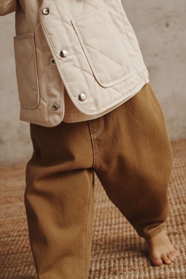 the Arthur Worker Pants in Khaki paired with the Isobel Jacket by the brand Alfred