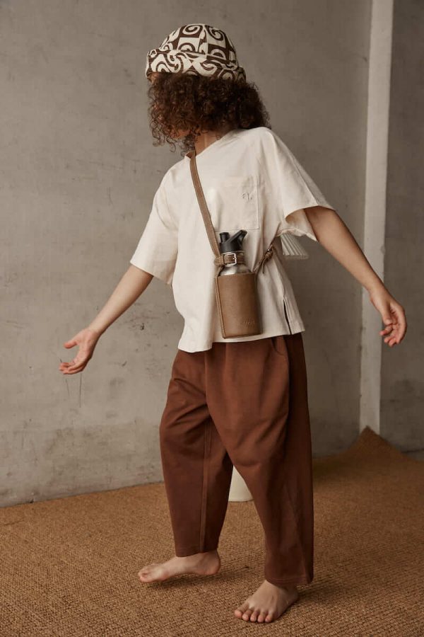 the Boris Pants in Chocolate paired with the Walter Tee by the brand Alfred