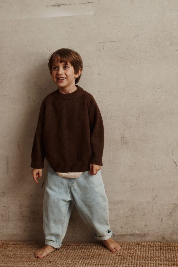 the Bruno Jumper in Chocolate paired with the Franklin Denim by the brand Alfred